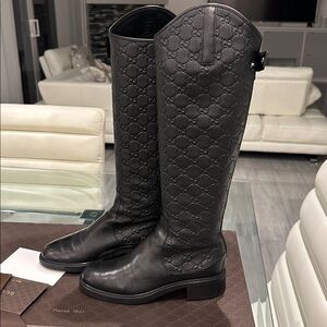 Authentic Gucci Calfskin Miro Soft Knee High
Riding Black Embossed Leather Boots